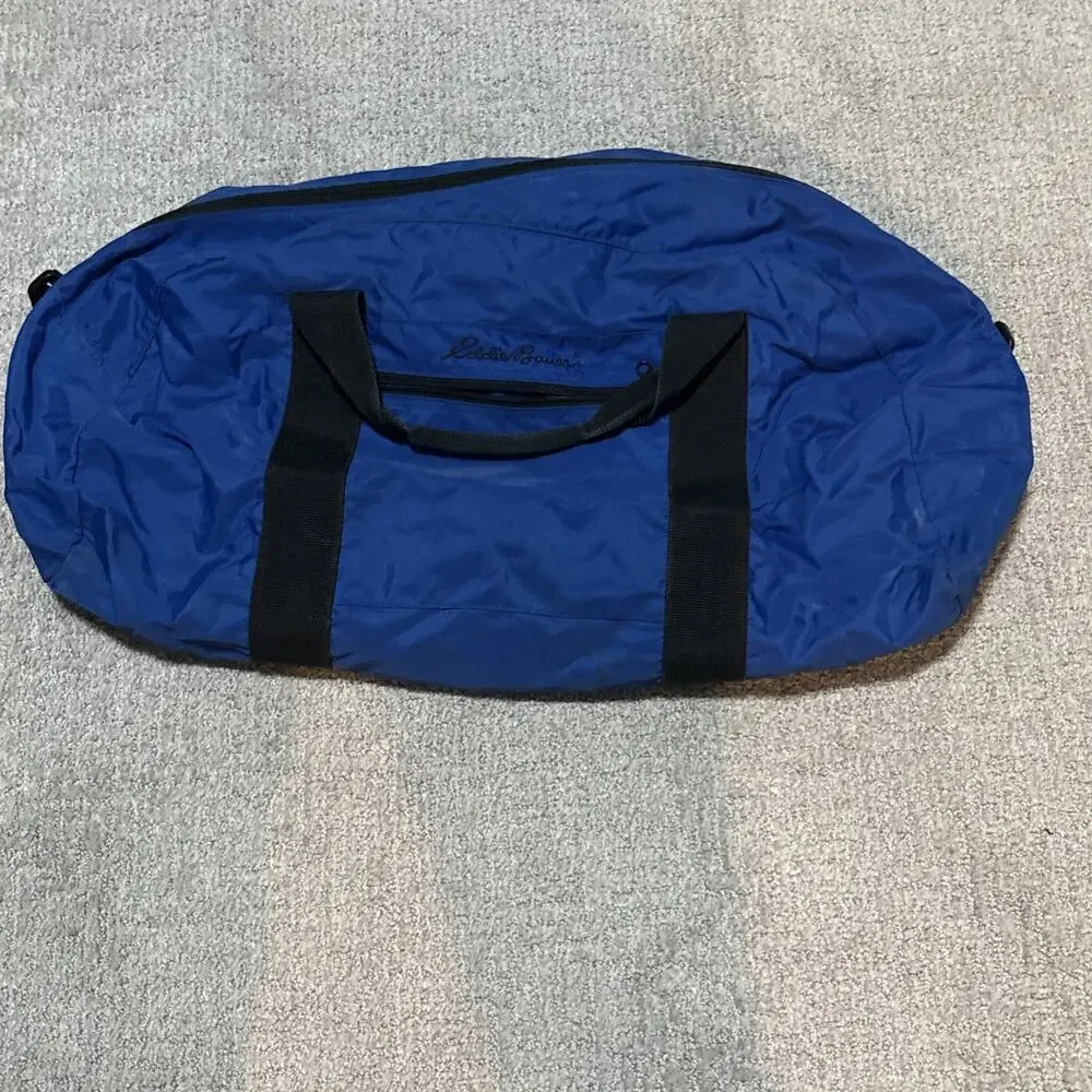 Eddie Bauer blue and black collapsible duffel bag